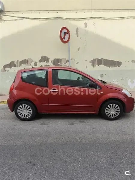 Usado Citroën C2 61 CV (44 kW) 2004 Rojo Utilitario