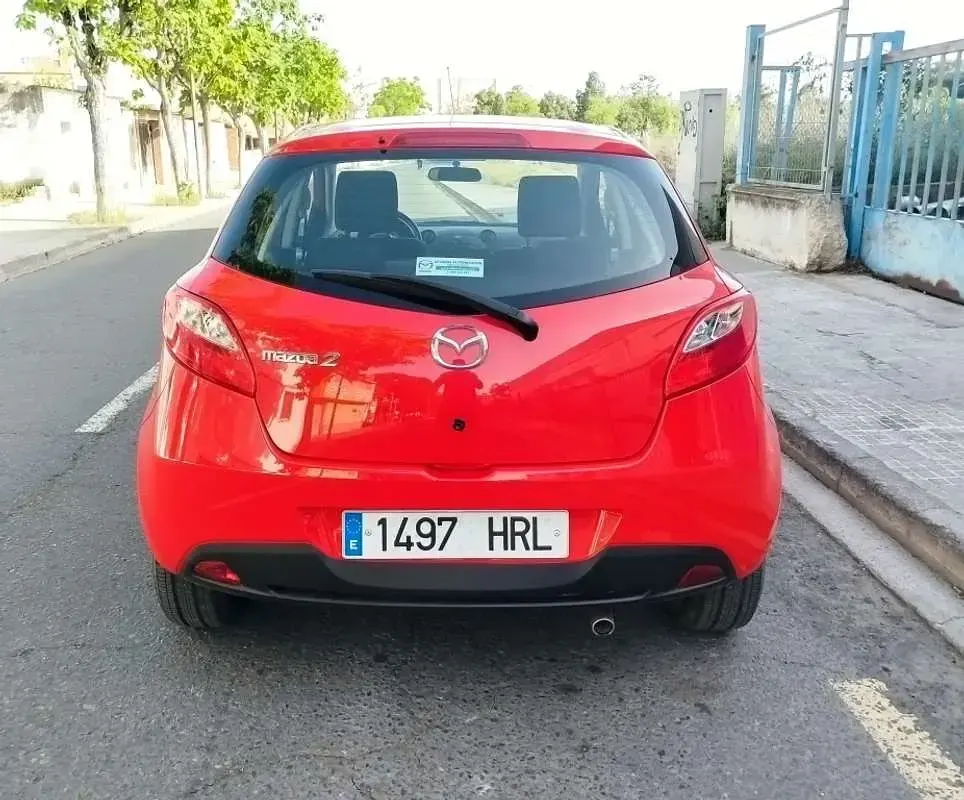 Käytetty Mazda 2 75 HP (55 kW) 2013 Punainen Viistoperä
