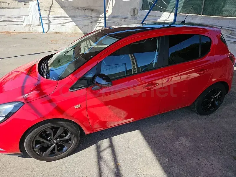 Usado Opel Corsa Selective 90 CV (66 kW) 2017 Rojo Utilitario