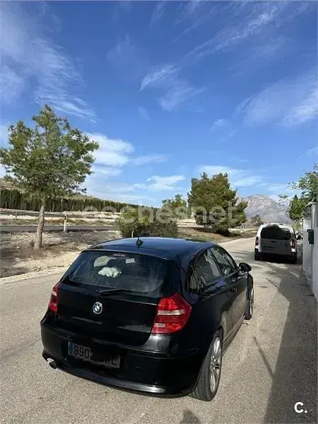 Usado BMW 116 115 CV (84 kW) 2010 Negro Utilitario
