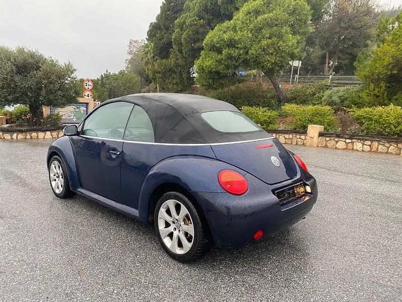 Usado VW New Beetle 100 CV (73 kW) 2004 Azul Utilitario