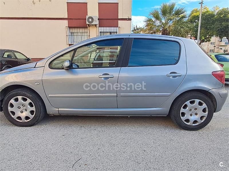 Usado Peugeot 307 110 CV (80 kW) 2004 Gris / plata Berlina