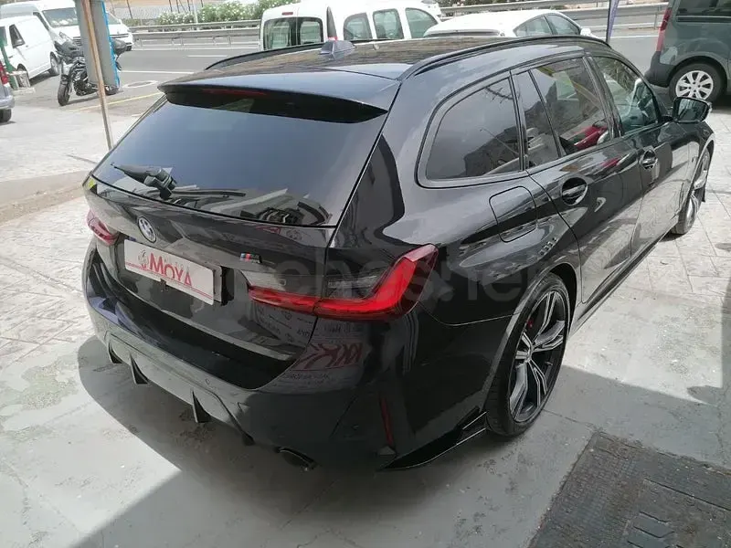 Usado BMW 320e 204 CV (150 kW) 2023 Negro Familiar