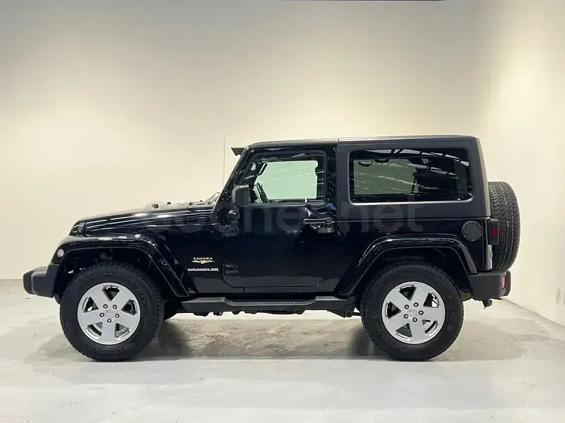 Usado Jeep Wrangler Sahara 200 CV (147 kW) 2012 Negro SUV