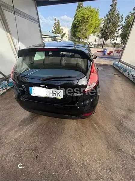 Usado Ford Fiesta Trend 75 CV (55 kW) 2013 Negro Berlina