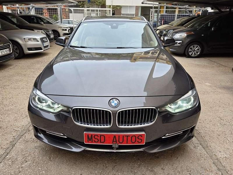 Gris Usado 2012 BMW 330 Luxury Line Familiar | 9850 € - Imagen 1/4