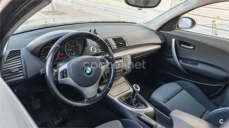 Usado BMW 118 122 CV (89 kW) 2006 Negro Utilitario