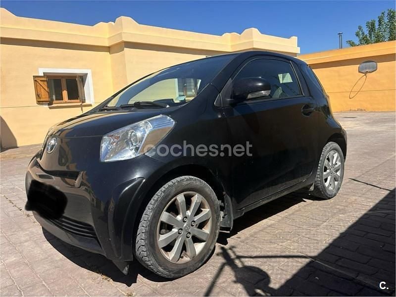 Usado Toyota iQ 68 CV (50 kW) 2013 Negro Utilitario