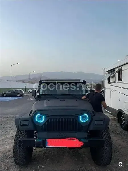 Usado Jeep Wrangler 118 CV (86 kW) 2001 Negro SUV