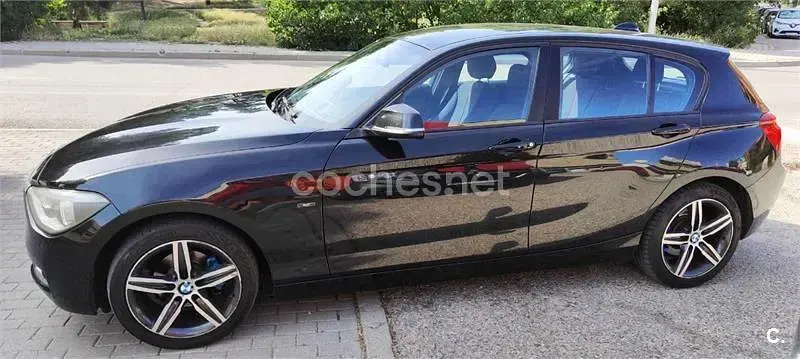 Usado BMW 118 Sport Line 143 CV (105 kW) 2012 Negro Utilitario