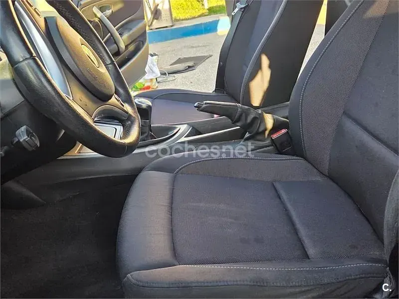 Usado BMW 116 115 CV (84 kW) 2010 Azul Utilitario