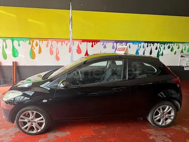 Usado Mazda 2 Active 75 CV (55 kW) 2009 Negro Utilitario