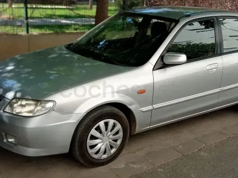 Usado Mazda 323 Exclusive 100 CV (73 kW) 2002 Gris / plata Berlina