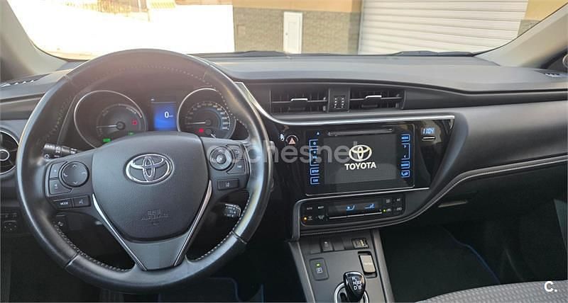 Usado Toyota Auris Hybrid Edition 136 CV (100 kW) 2017 Azul Berlina