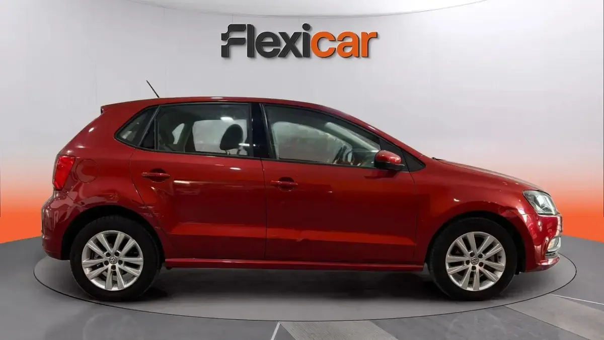 Usado VW Polo 90 CV (66 kW) 2017 Naranja Berlina