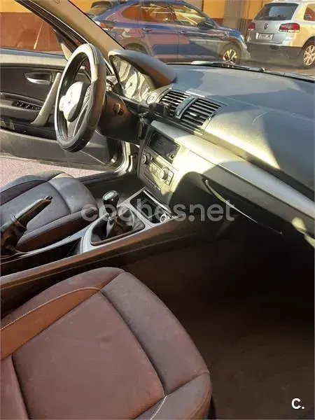 Usado BMW 118 122 CV (89 kW) 2008 Azul Utilitario