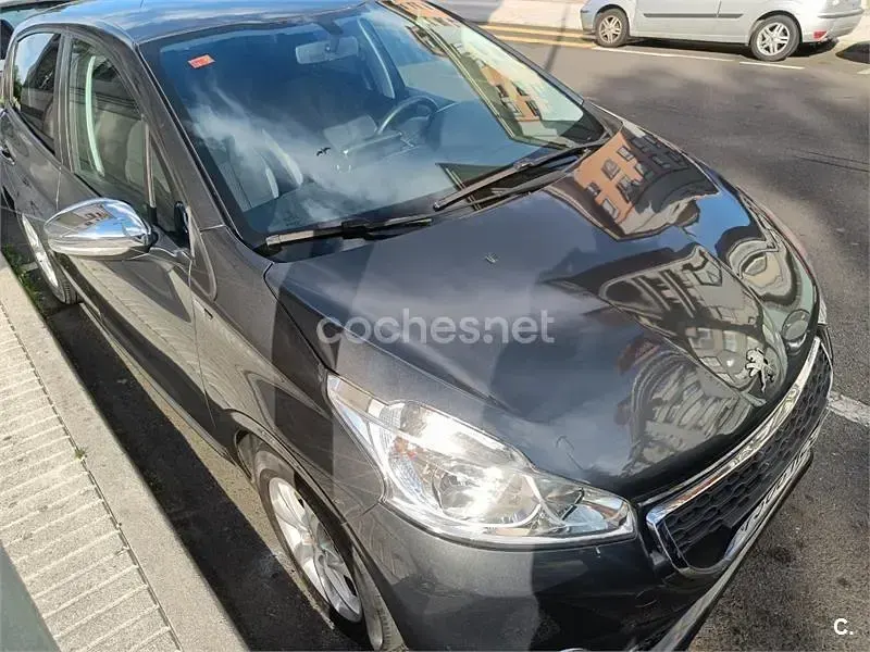 Usado Peugeot 208 Style 68 CV (50 kW) 2014 Gris / plata Utilitario