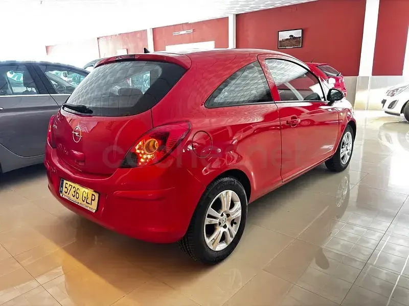 Usado Opel Corsa 80 CV (58 kW) 2009 Rojo Utilitario