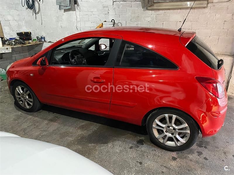 Usado Opel Corsa Enjoy 90 HP (66 kW) 2007 Vermelho Citadino