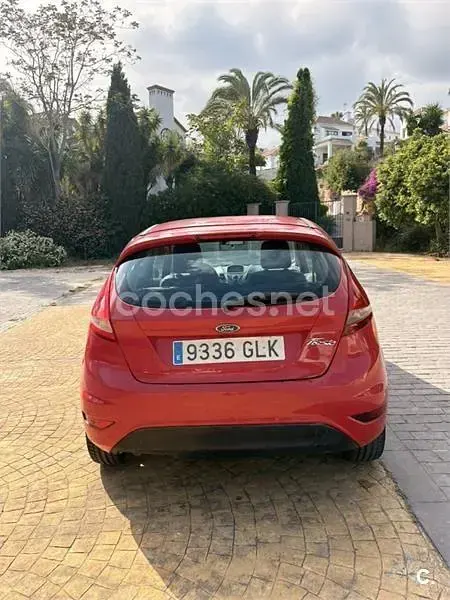 Usado Ford Fiesta Trend 82 HP (60 kW) 2009 Vermelho Sedan