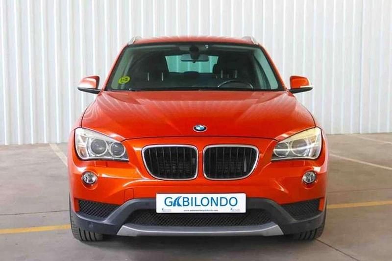 Używany BMW X1 143 KM (105 kW) 2013 Pomarańczowy SUV