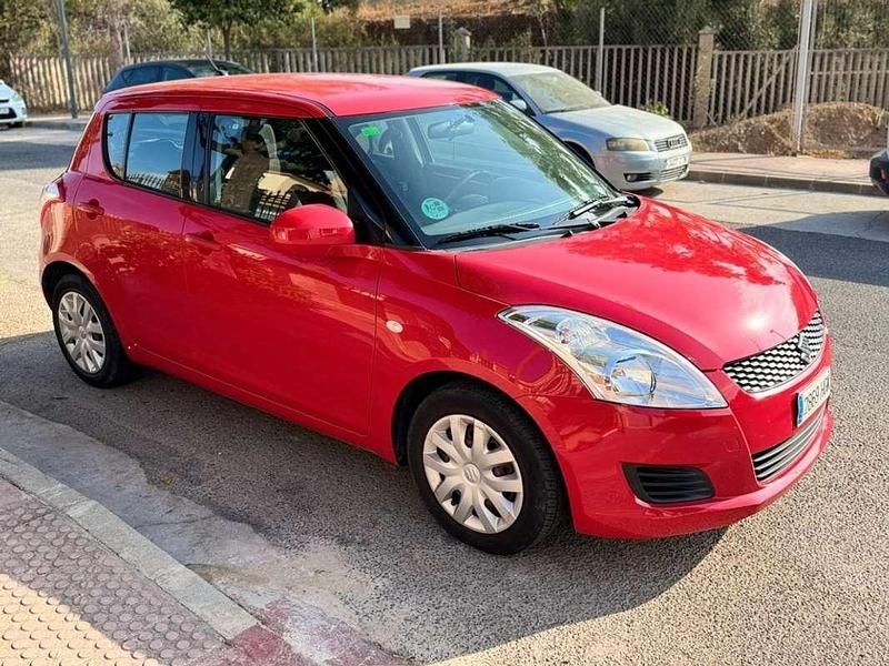 Usado Suzuki Swift GL 94 CV (69 kW) 2011 Rojo Utilitario