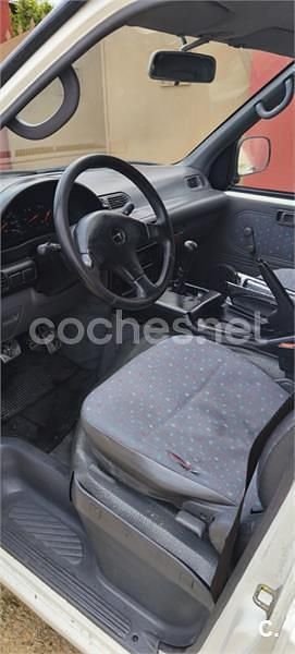 Usado Nissan Cargo 75 CV (55 kW) 1997 Blanco Familiar