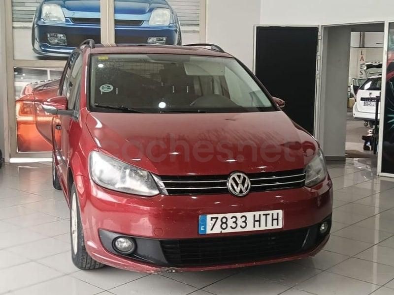 Usado VW Touran Advance 105 CV (77 kW) 2012 Granate Monovolumen
