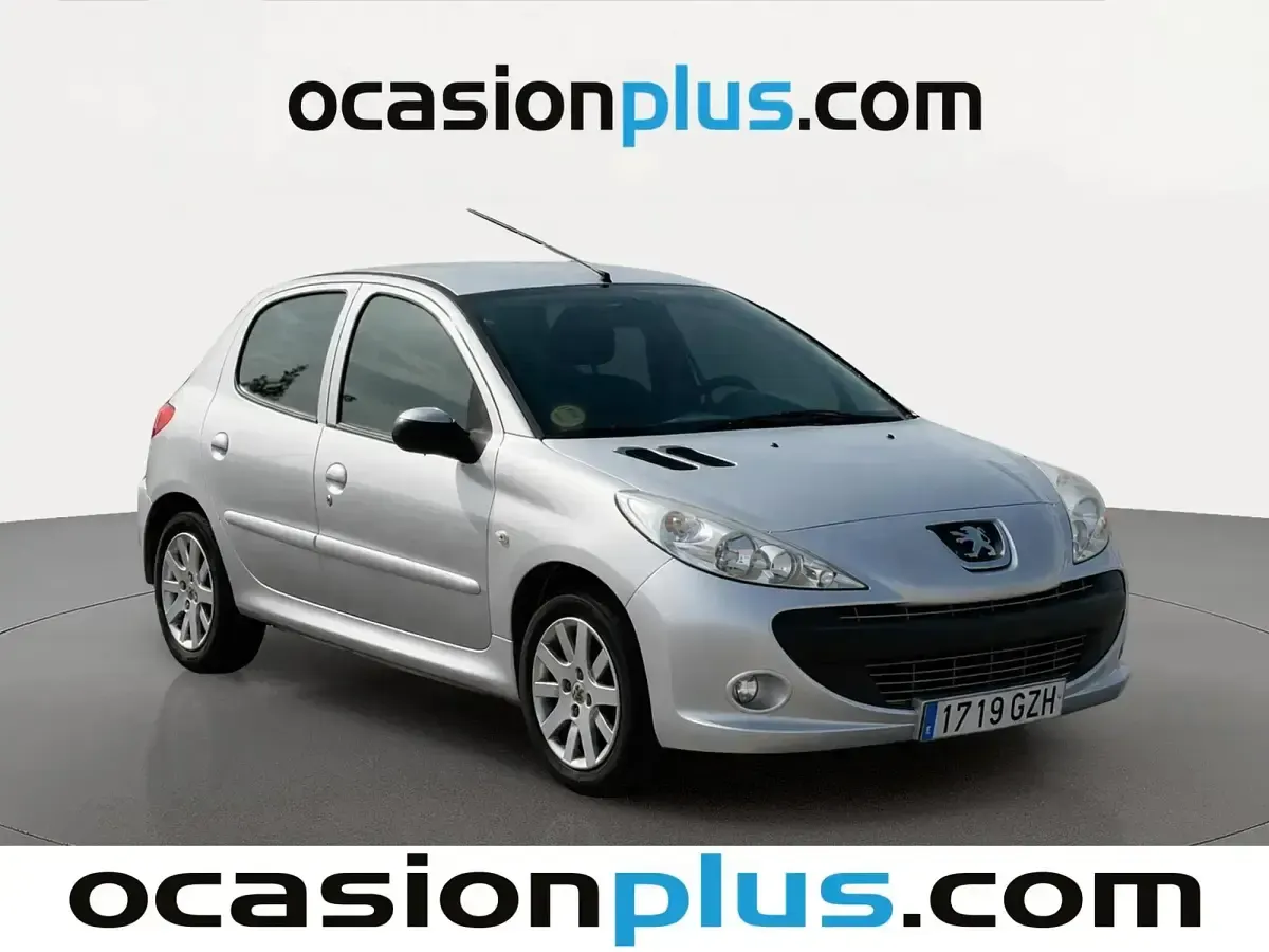 Usado Peugeot 206 70 CV (51 kW) 2010 Gris Utilitario