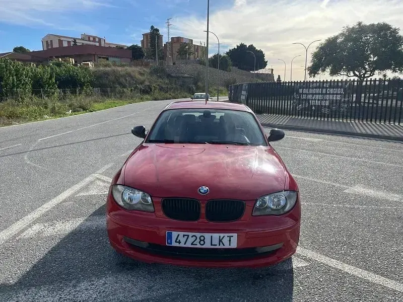 Usado BMW 116 115 CV (84 kW) 2010 Rojo Utilitario
