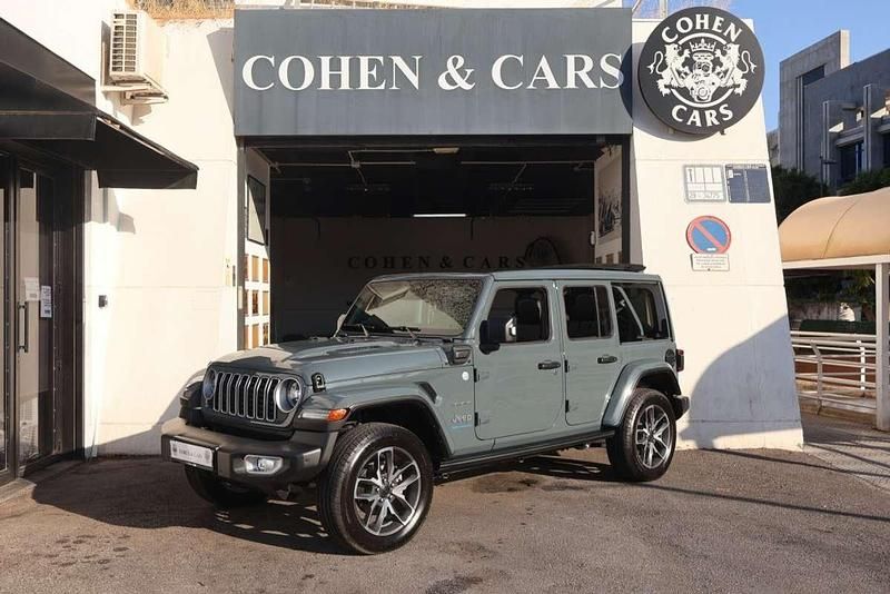 Gris Usado 2024 Jeep Wrangler Unlimited Sahara SUV | 74.900 € - Imagen 1/4