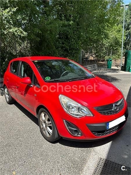 Rojo Usado 2011 Opel Corsa Berlina | 6475 € (Precio justo) - Imagen 1/4
