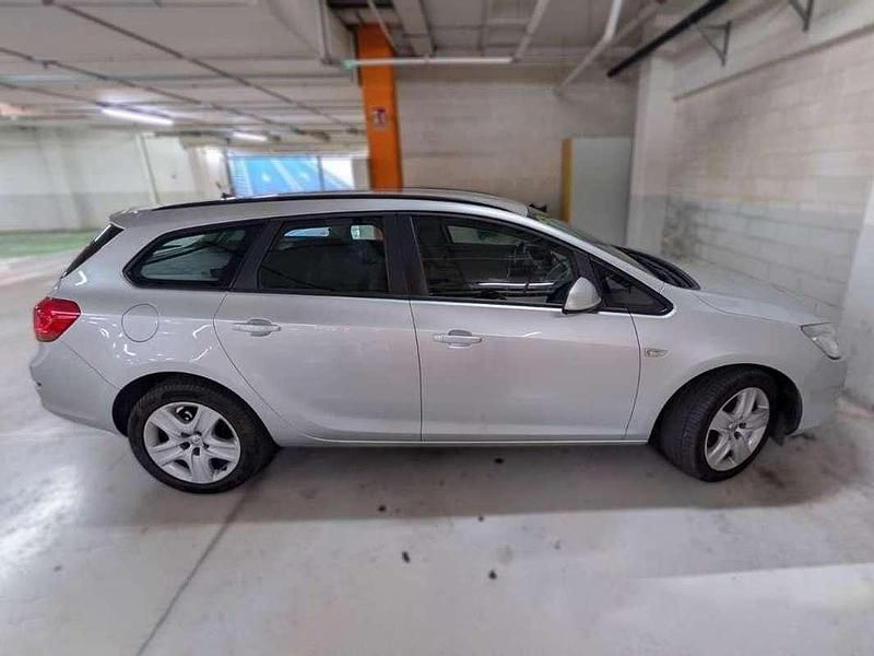 Usado Opel Astra Business 125 HP (91 kW) 2013 Cinzento Carrinha