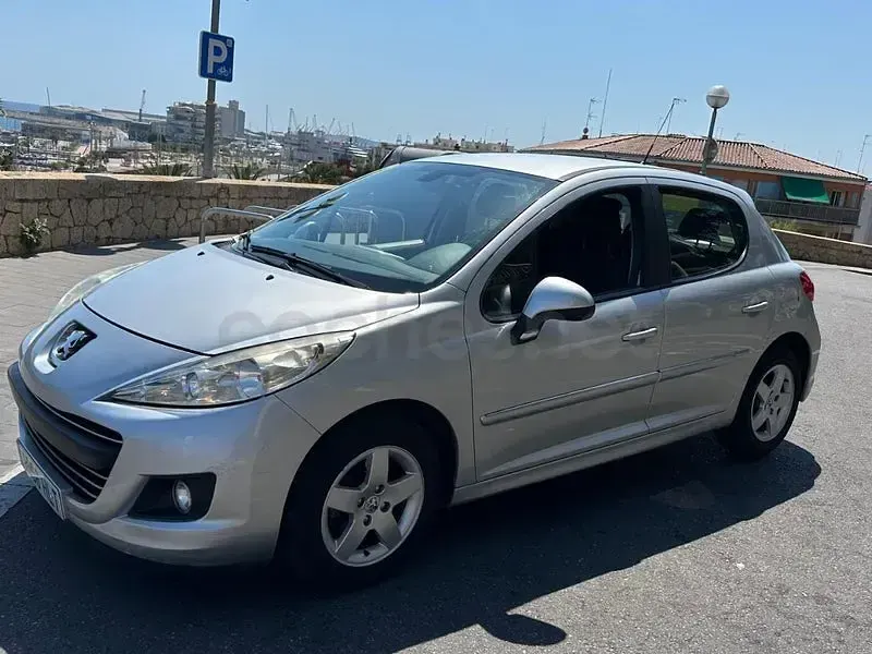 Usado Peugeot 207 75 CV (55 kW) 2012 Gris / plata Berlina