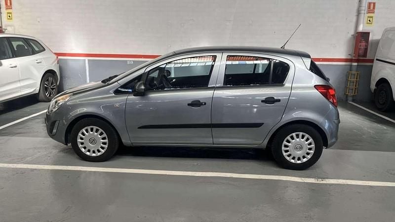 Usado Opel Corsa Selective 86 CV (63 kW) 2013 Gris Utilitario