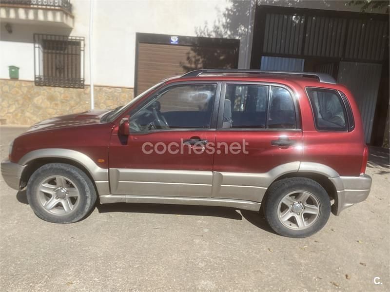 Usado Suzuki Grand Vitara 110 CV (80 kW) 2002 Granate SUV