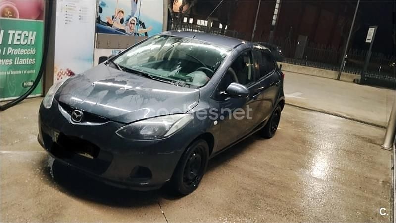 Usado Mazda 2 Active 68 CV (50 kW) 2009 Granate Utilitario
