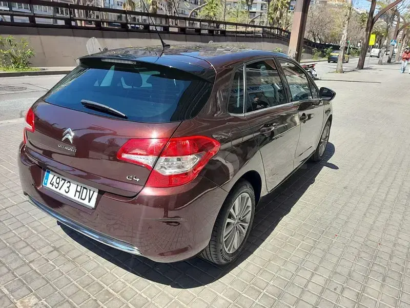 Usado Citroën C4 Exclusive 112 CV (82 kW) 2012 Granate Berlina