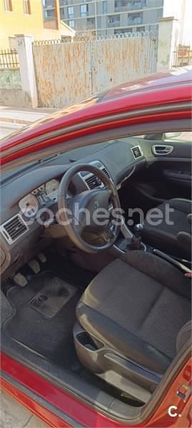 Usado Peugeot 307 110 CV (80 kW) 2006 Granate Berlina