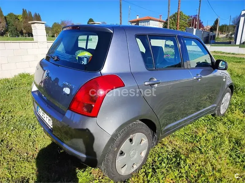Usado Suzuki Swift GLX 69 CV (50 kW) 2007 Gris / plata Utilitario
