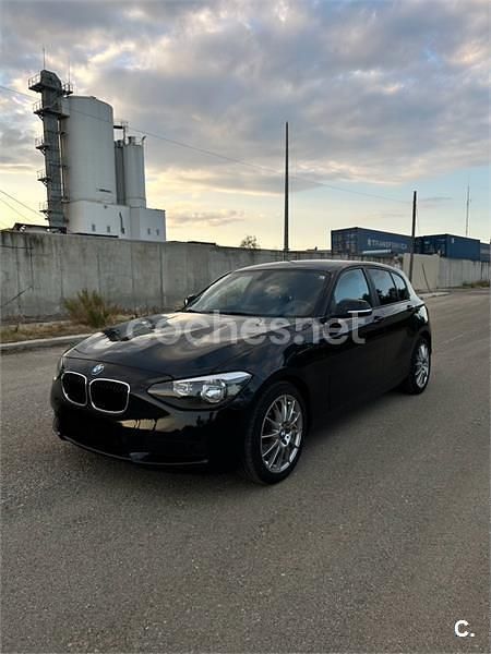 Negro Usado 2012 BMW 116 Sport Line Utilitario | 7990 € (Buen precio) - Imagen 1/4
