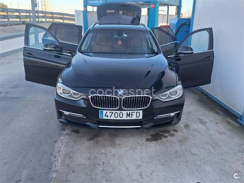 Negro Usado 2013 BMW 318 Comfort Edition Familiar | 13.500 € (Caro) - Imagen 1/4