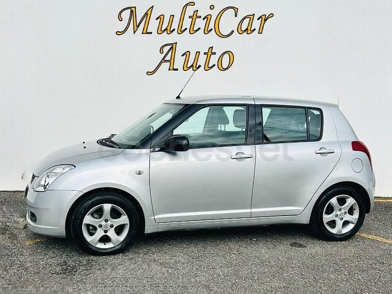 Usado Suzuki Swift GL 92 CV (67 kW) 2006 Gris / plata Berlina