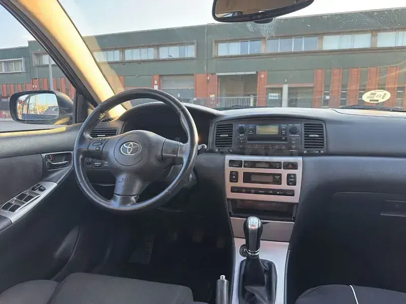 Usado Toyota Corolla Sol 110 CV (80 kW) 2004 Negro Berlina