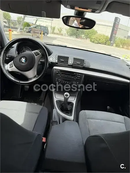Usado BMW 118 122 CV (89 kW) 2006 Negro Utilitario