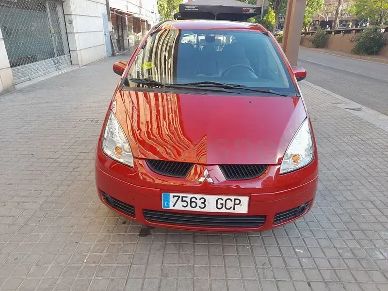 Usado Mitsubishi Colt 95 CV (69 kW) 2008 Granate Monovolumen