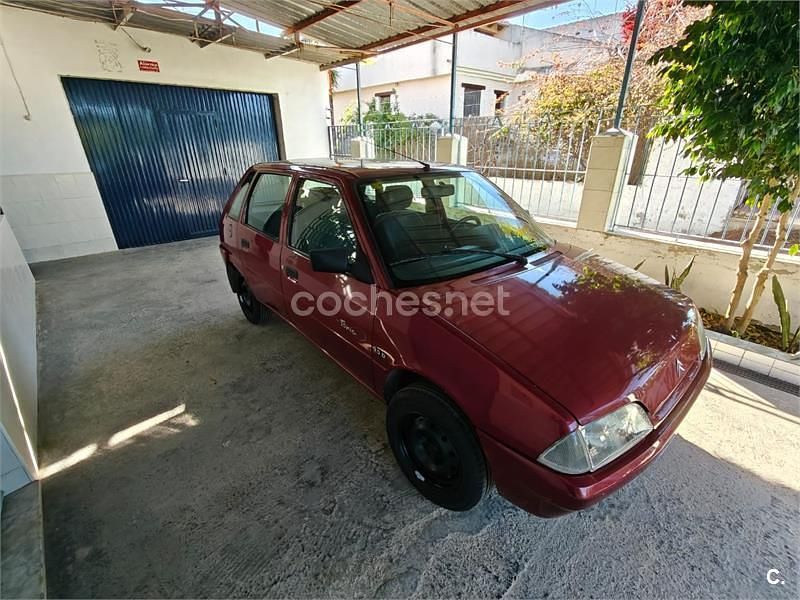 Usado Citroën AX Tonic 58 CV (42 kW) 1996 Granate Utilitario