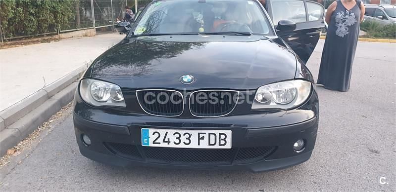 Usado BMW 118 122 CV (89 kW) 2006 Negro Utilitario