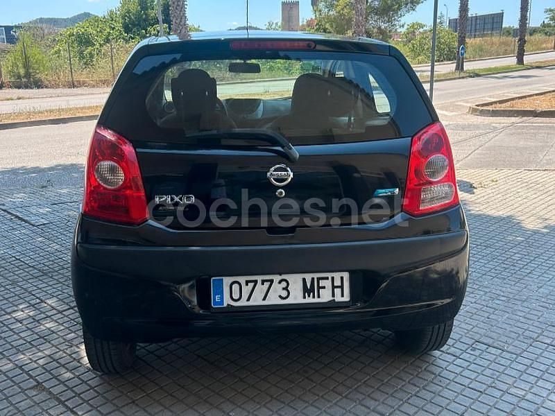 Usado Nissan Pixo Acenta 68 CV (50 kW) 2010 Negro Utilitario