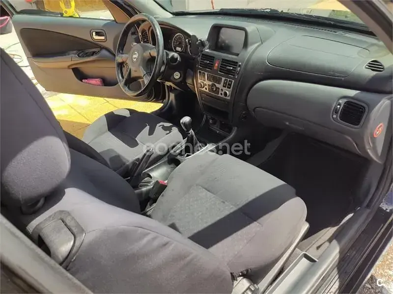 Usado Nissan Almera 112 CV (82 kW) 2006 Negro Berlina